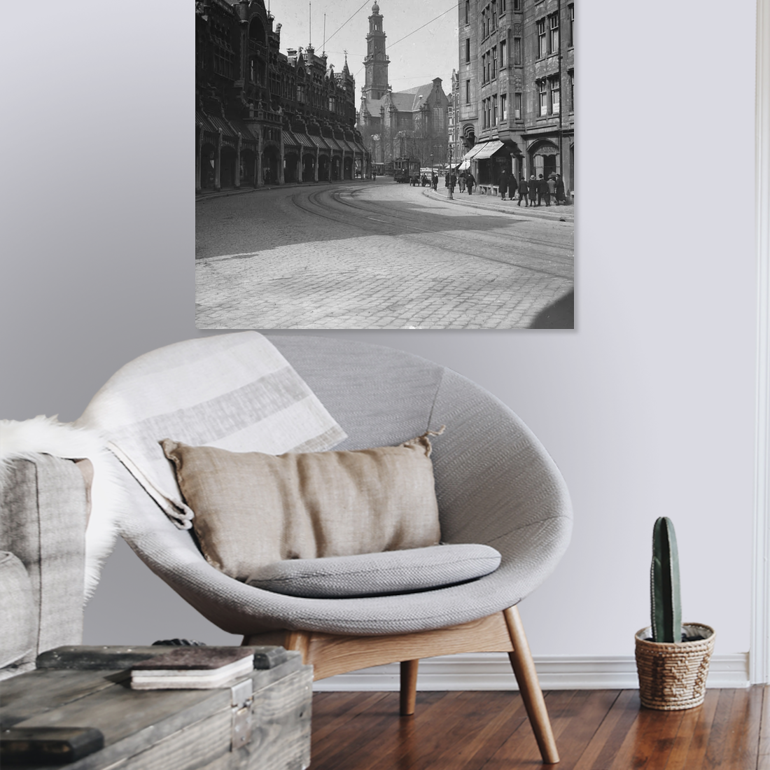Zwart-witfoto uit omstreeks 1930 van de Raadhuisstraat in Amsterdam. – canvas zonder lijst in leeshoek