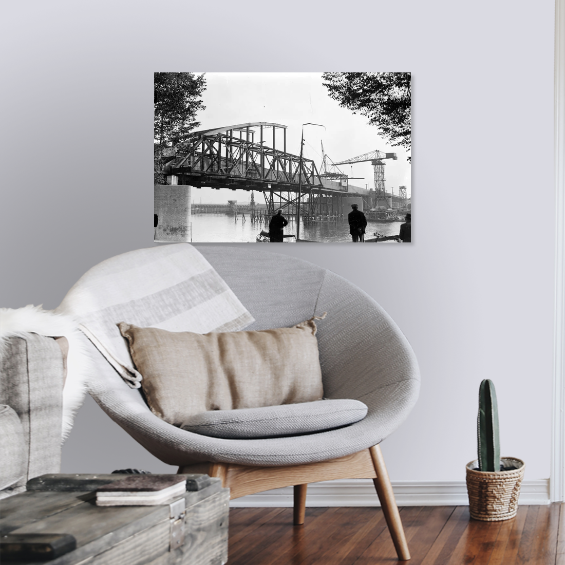 Zwart-witfoto uit 1934 van de bouw van de Rijnbrug bij Arnhem. – canvas zonder lijst in leeshoek