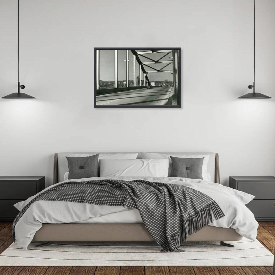 Zwart-witfoto uit omstreeks 1960 van de Rijnbrug bij Arnhem met zicht op het centrum. – canvas zwarte baklijst in slaapkamer