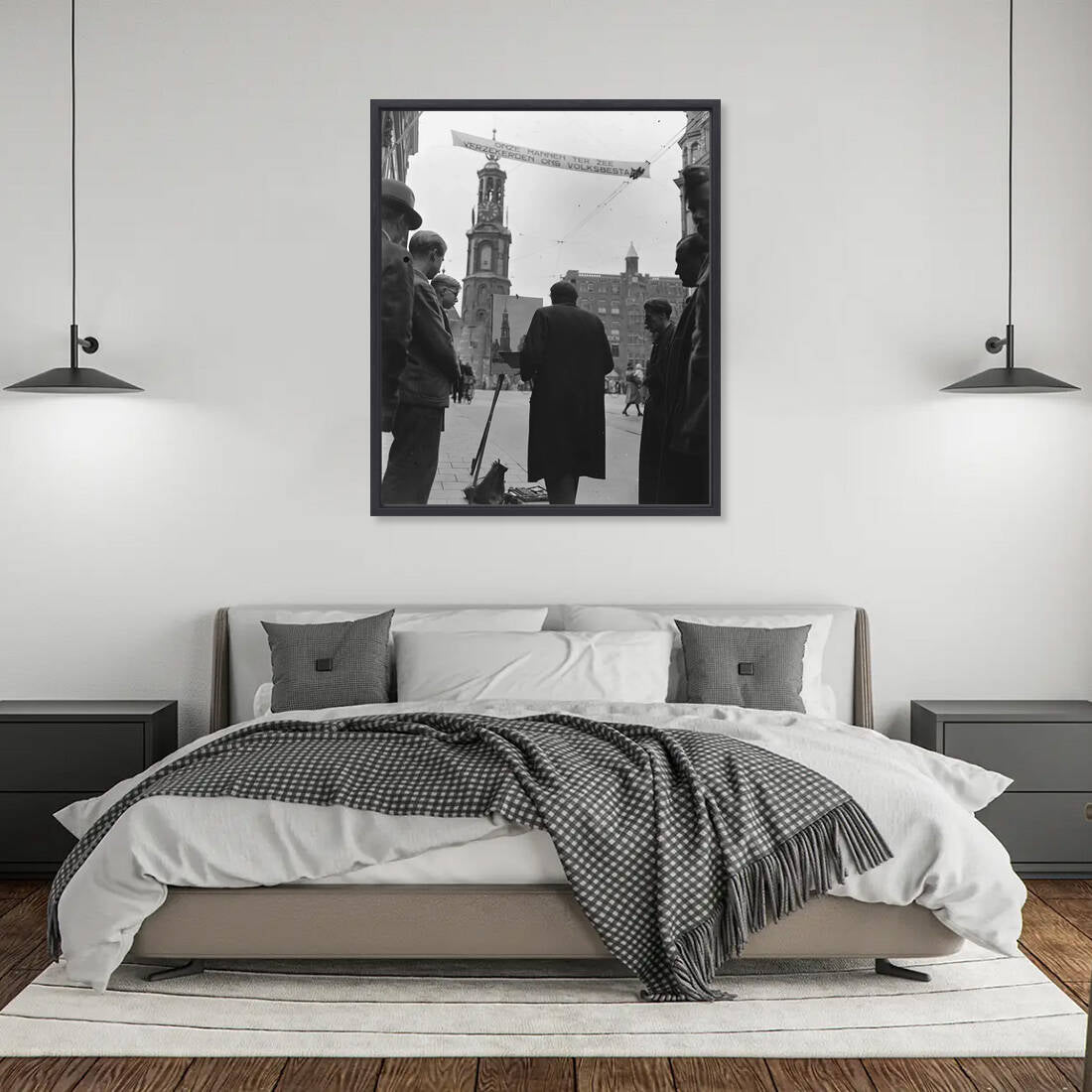Zwart-witfoto uit 1945 van een straatschilder aan het werk in Amsterdam. – canvas zwarte baklijst in slaapkamer